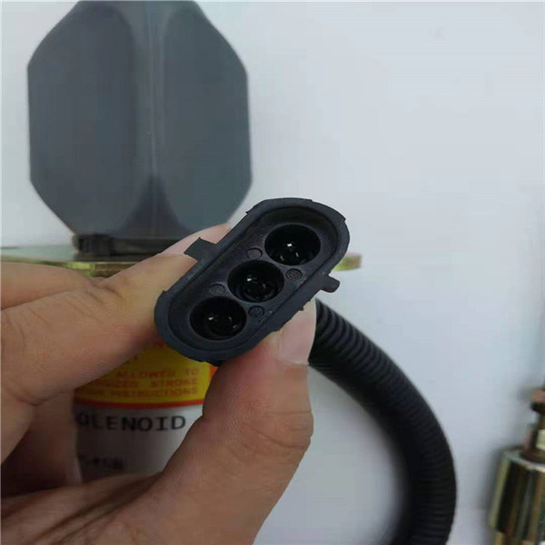 Клапан соленоида 3935458 стопов приспособленный для двигателя 5.9L 8.3L 4BT 6BT 12V дизельного топлива